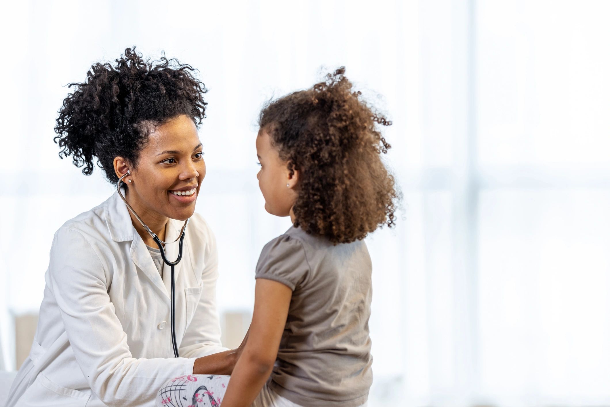 Records assistant helping a family with care details