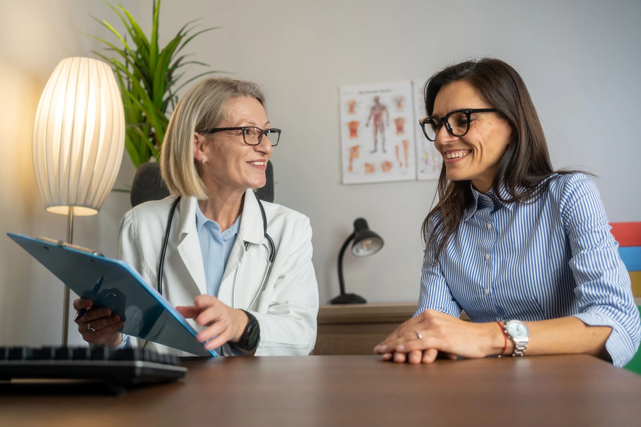 Doctor discussing care with a patient in an office