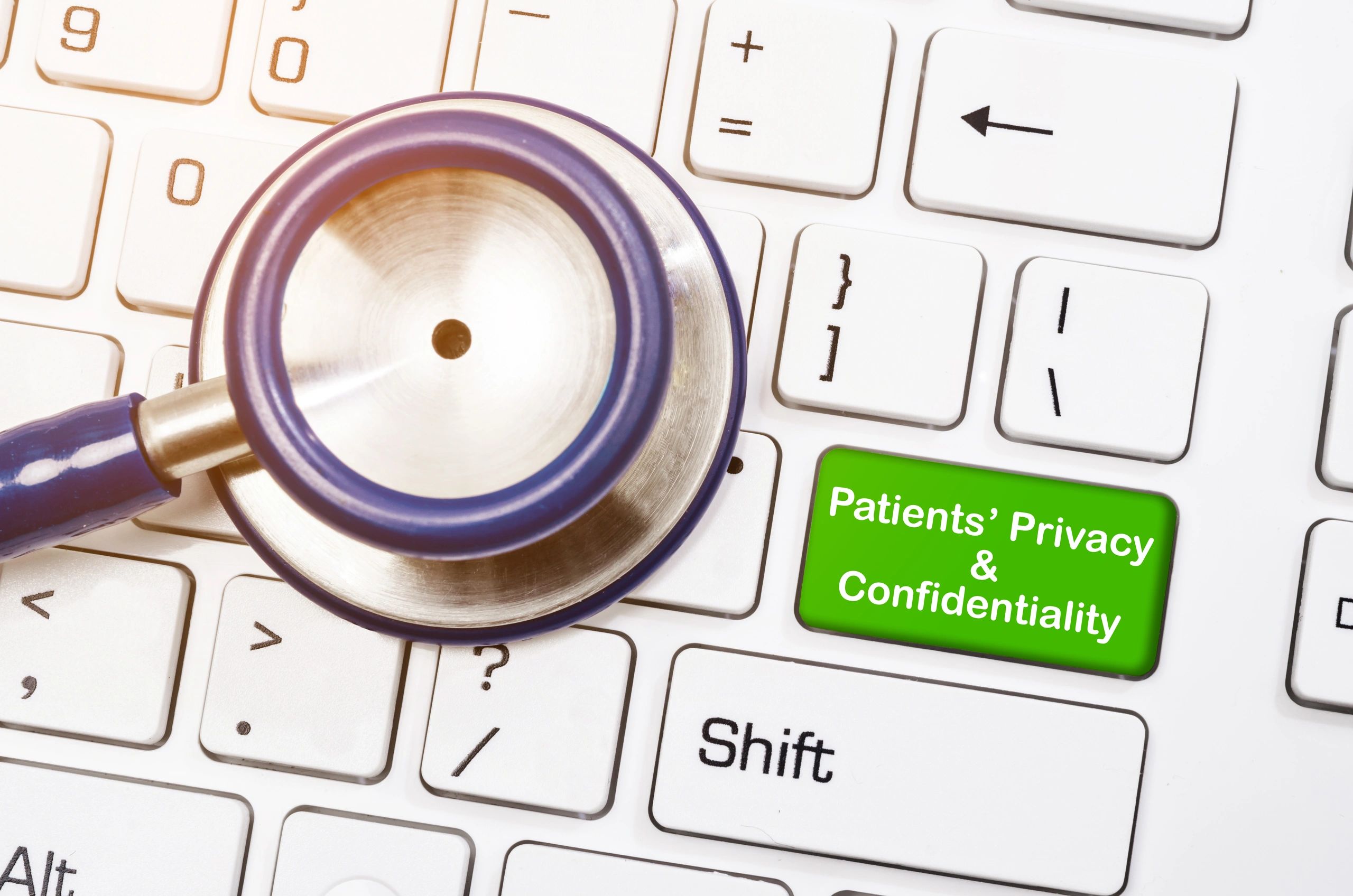 Stethoscope and keyboard representing patient privacy and confidentiality